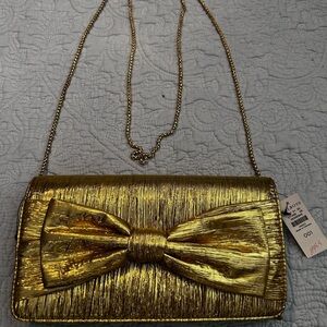 Gold clutch purse by Talbots .  Brand new